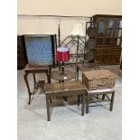 Eleven items of miscellaneous furniture to include a Lloyd Loom linen basket, carved oak table etc.