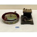 A live steam single cylinder stationary engine and a tinplate 'The New Derby Game'