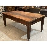A Victorian mahogany table, the cleated plank top over a frieze drawer on joined base and square