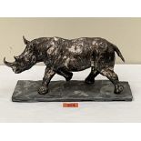 ROBERT RATTRAY. IRISH/WELSH CONTEMPORY A sterling silver sculpture of a rhinocerus. Signed and