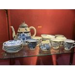 A 19th century Chinese blue and white decorated tea service of twenty pieces. Concentric circle