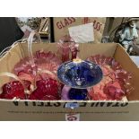 Eight items of cranberry glass and a blue glass comport
