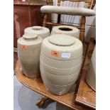 Four stoneware barrels