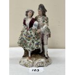 A 19th century German porcelain group of two lovers in gaily painted attire. Indistinct mark in