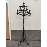 A wrought iron gothic five light lamp standard. 78' high.