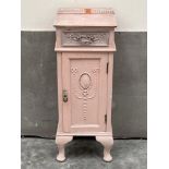 A painted pine bedside cupboard in the French manner. 29' high