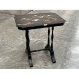 A 19th century japanned side table, the painted top inlaid with mother-of-pearl. 26' wide