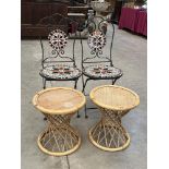 A pair of tiled patio chairs and a pair of cane occasional tables