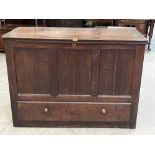 An 18th century joined oak mule chest with base drawer, the sides panelled. 50' wide