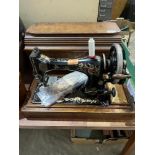 A cased Singer sewing machine