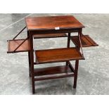 An unusual Edward VII mahogany serving table with drop-down shelves to each side. The top 21' wide