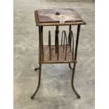 A Victorian marble topped and copper plated iron etagere, the lower stage a music or periodical