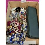 A box of costume jewellery and sundries