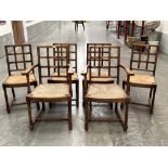 Philip Tilden and Ambrose Heal. A set of six oak dining chairs with drop-in rush seats; the set to