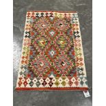 A Chobi Kilim rug. 1.23m x 0.79m