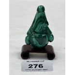 A Chinese carved malachite snuff bottle on stand. 2¾' high