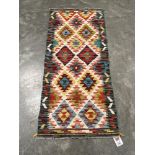 A Chobi Kilim runner 1.5m x 0.64