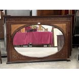 An Edward VII mahogany line and foliate inlaid overmantle with oval plate. 48' wide