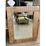 A reclaimed timber framed wall mirror. 38' high