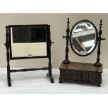 A Victorian walnut dressing table mirror with oval bevelled plate and base drawer, 12½' wide; the