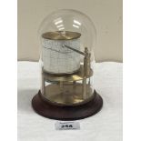 A brass barograph under a glass dome. 6½' high