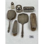 Two silver backed clothes brushes; a silver backed hairbrush; a silver hand mirror; a cut glass