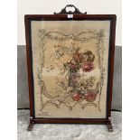 A late 19th century mahogany fire screen, the needlework banner by Gobelins Manufactory, Paris.