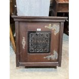 A Victorian mahogany wall cupboard enclosed by an overlaid glazed door. 24' high