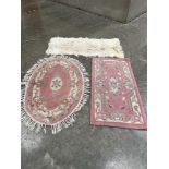 Two Chinese rugs and a sheepskin (3)