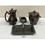 Three items of Tudric pewter to comprise a rectilinear basket; a jar and cover and a cream jug,