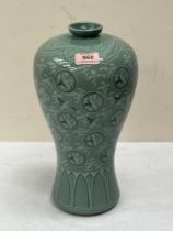 A Korean celadon glazed inverted baluster vase. 13¾' high.