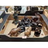 A box of oriental carvings etc.