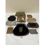 A collection of vintage and modern lady's evening bags and purses.