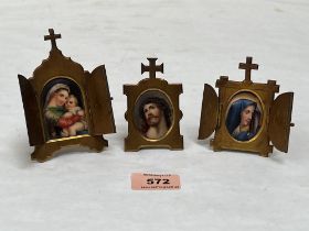 Three 19th century Limoges plaque and gilt brass framed travel icons. 4¼' high and smaller