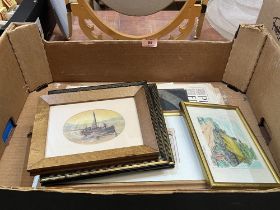 A box of small pictures with ephemera.