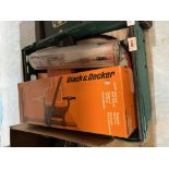 A box of Black + Decker and other tools.