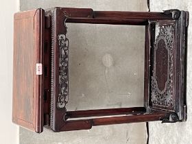 A 19th century Chinese rosewood pot stand. 17½'wide x 25½' high. Extensive loss to fretted carving