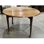 A 19th century drop leaf mahogany dining table on turned legs with pad feet. 47' wide