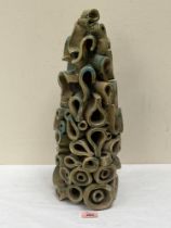 A glazed pottery abstract pottery sculpture, the base signed 'Henry Moore' and dated 3-7-36; the