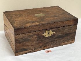 A Victorian rosewood writing slope with side drawer and military gilt brass handles, the lid with