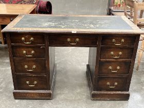 An oak kneehole desk. 48' wide