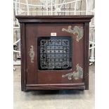 A Victorian mahogany wall cupboard enclosed by an overlaid glazed door. 24' high