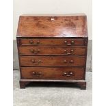 A George III mahogany bureau with fitted interior on bracket feet. 39' wide