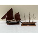Two scratch built model ships, the longer with 12' hull.