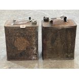 Two vintage Shell petrol cans.