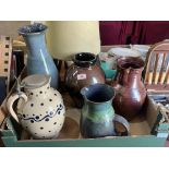Three pottery jugs and two vases