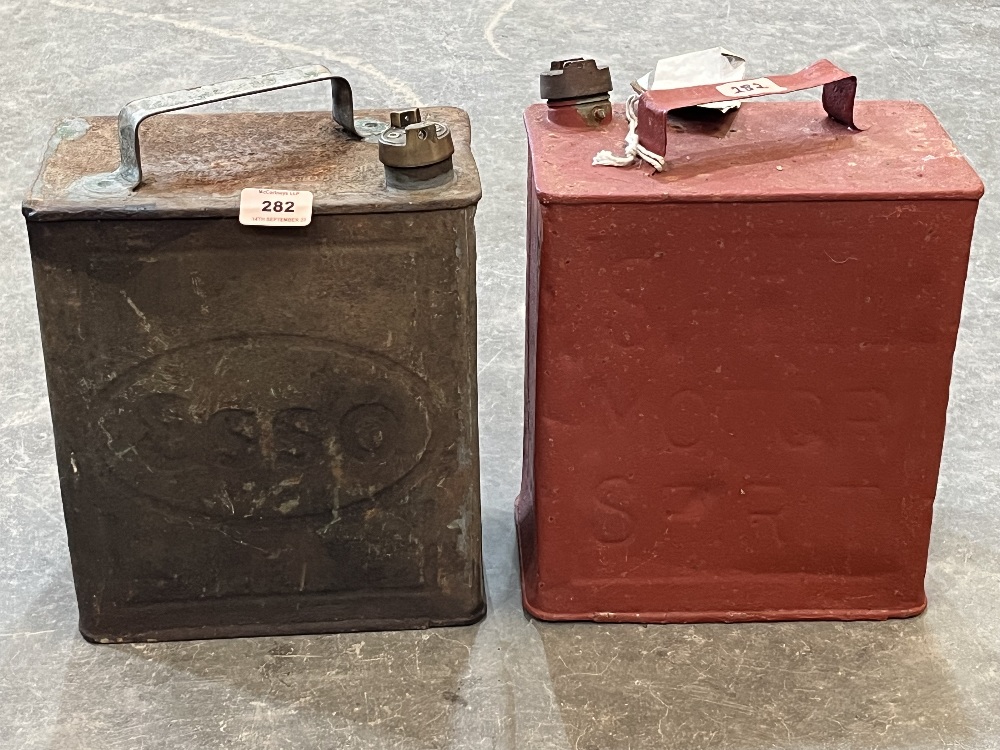 Two vintage petrol cans- Shell Motor Spirit and Esso.