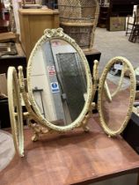 A triptych dressing mirror.