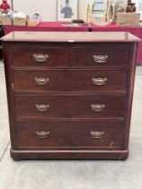 A Victorian mahogany chest of drawers on compressed bun feet. 42' wide