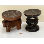 Two carved African stools. 8½' high.